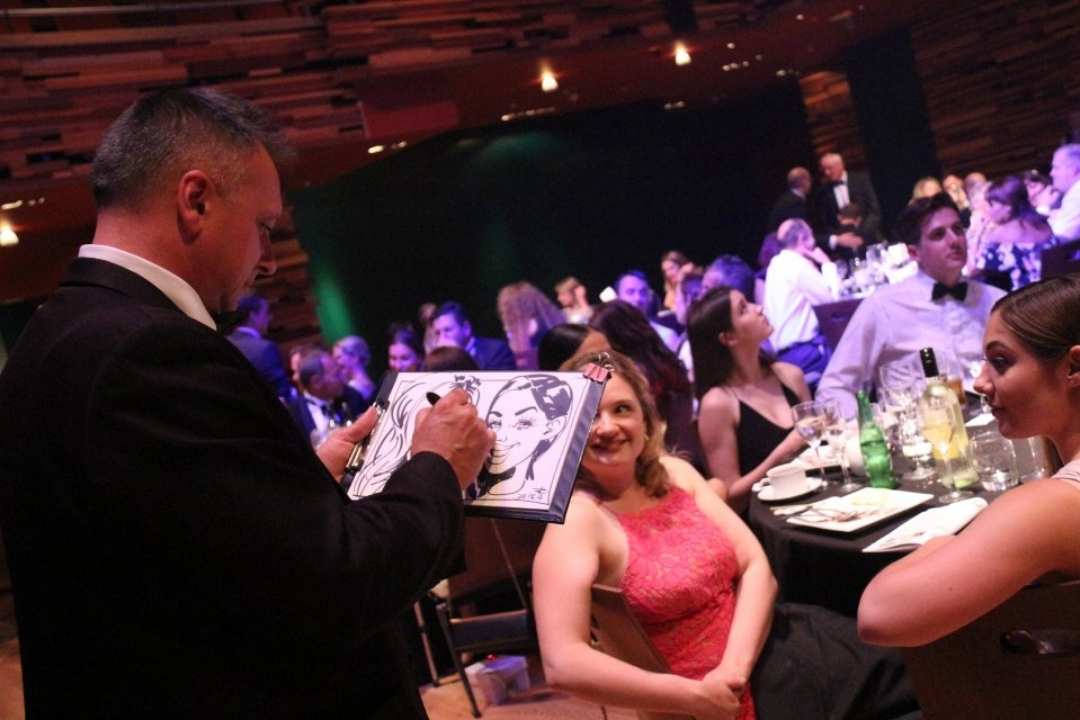 caricaturist at corporate party